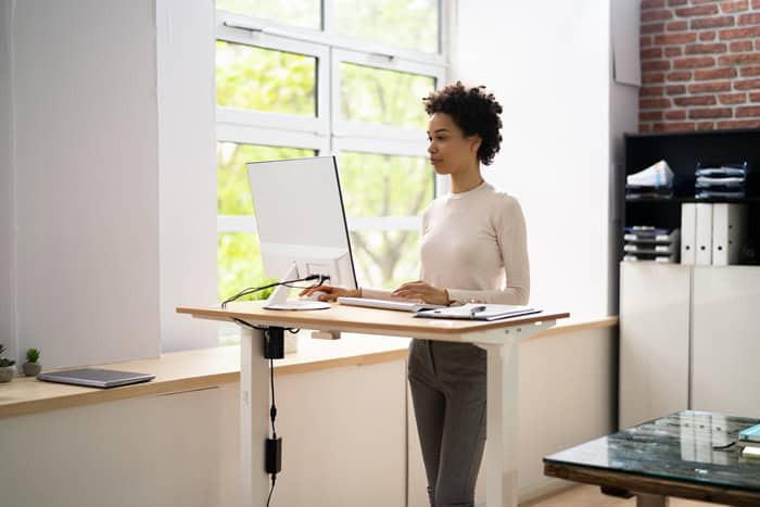 Moving more can help you age healthfully. One way to move more is use a standing desk while you work.